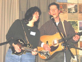 Tracy on mandolin and friend on guitar, vocalizing