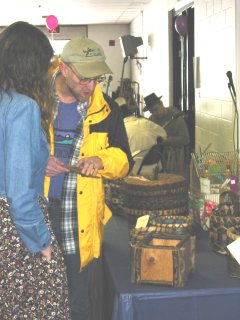 sample of baskets and other crafts displayed by vendors