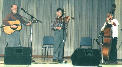 Tob O'Brien, guitar; Elmer Rich, fiddle; Judy Hiergeist, bass