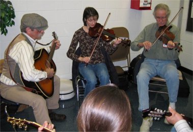 guitar and two fiddles