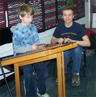 Two young boys jamming