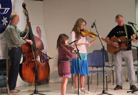 Richard Eddy and two of his students: Katie and Bella Zucker (with Ray Hicks playing on the left)